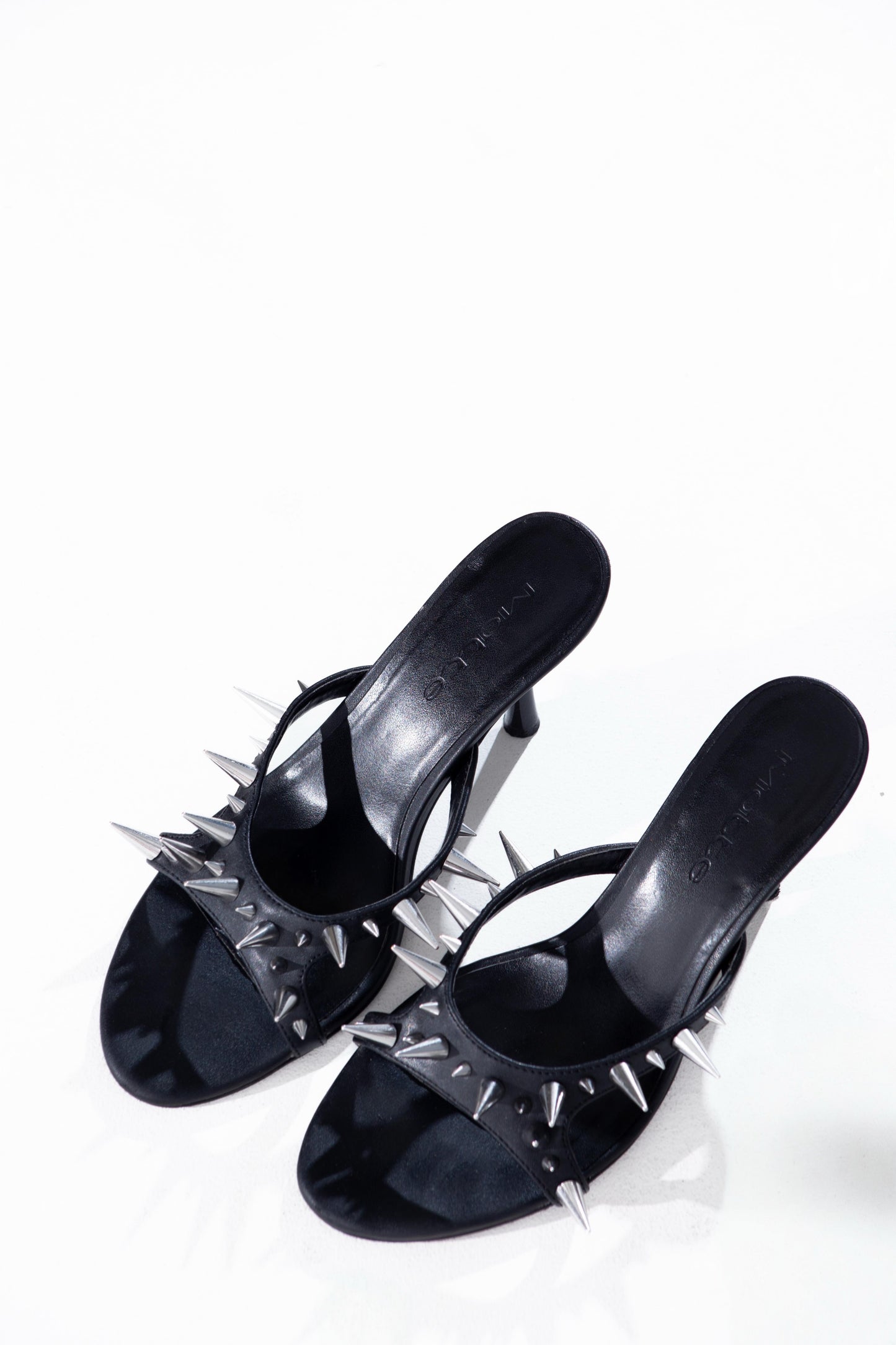 
                  
                    Spiked Heel (Black)
                  
                