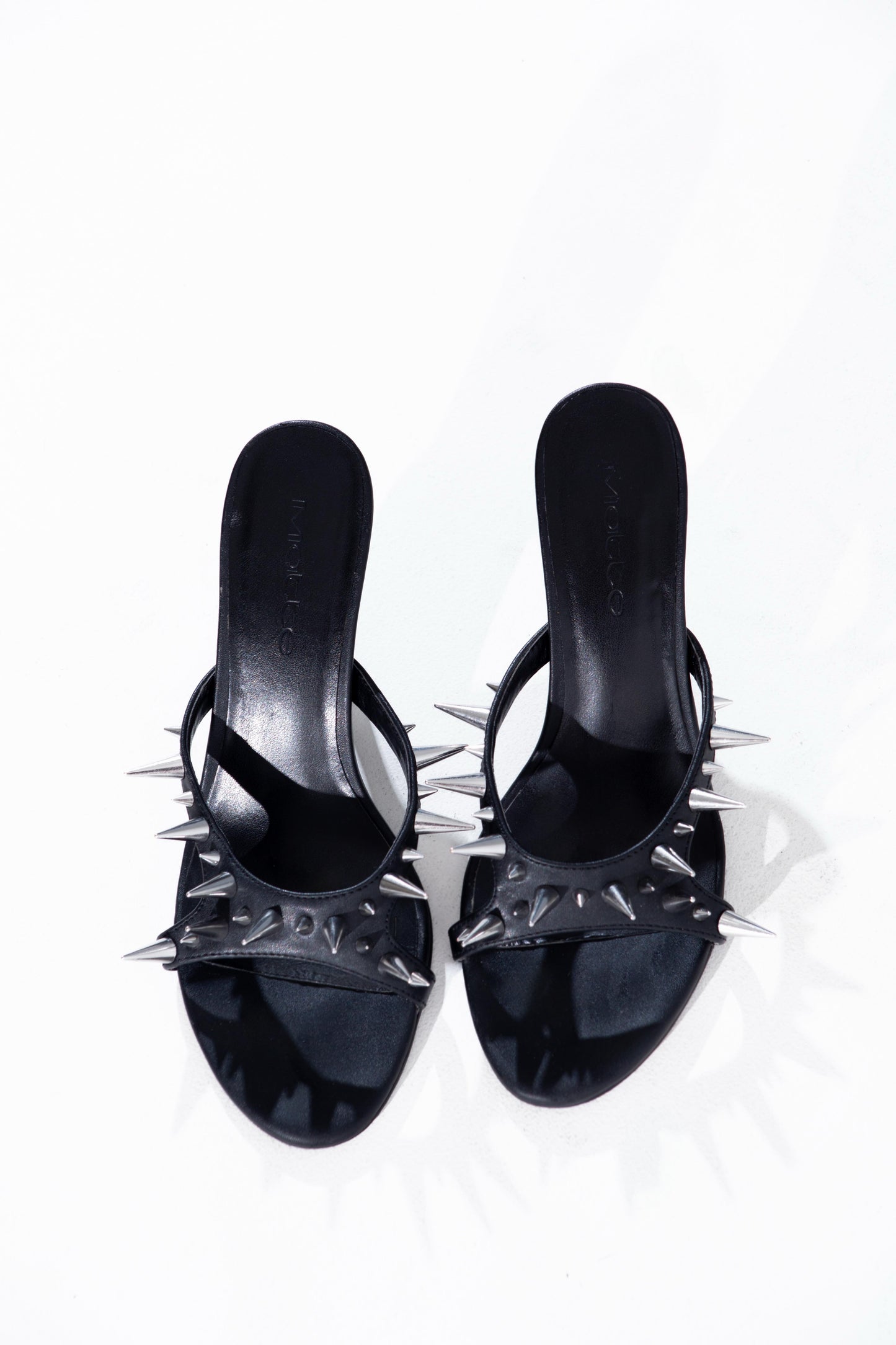 
                  
                    Spiked Heel (Black)
                  
                
