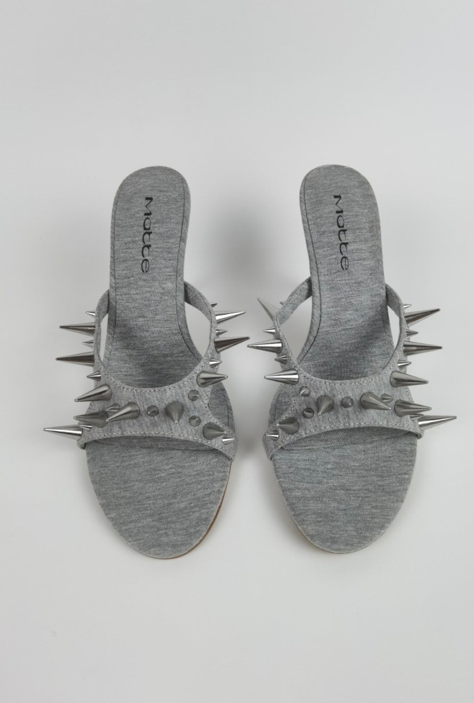 
                  
                    Spiked Heel (Grey)
                  
                